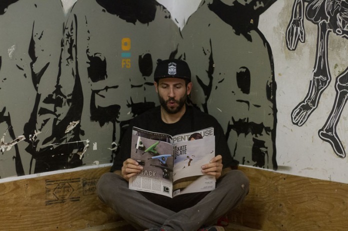 Checking out the latest issue at Flatspot Longboard Shop. Photo Aidan Lynds